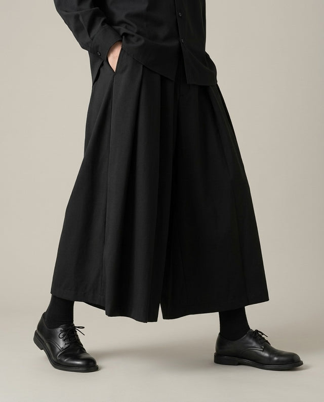 Men's japanese hakama pants, black pleated skirt panel, front view