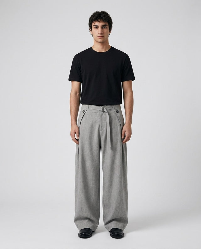 Mens pleated linen pants in gray on a model, front view