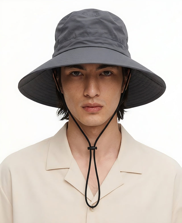 Wide Brim Quick Dry Bucket Hat for Big Heads on model, gray, front