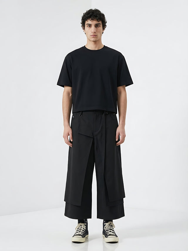 Japanese wide leg trousers worn by a model, front view