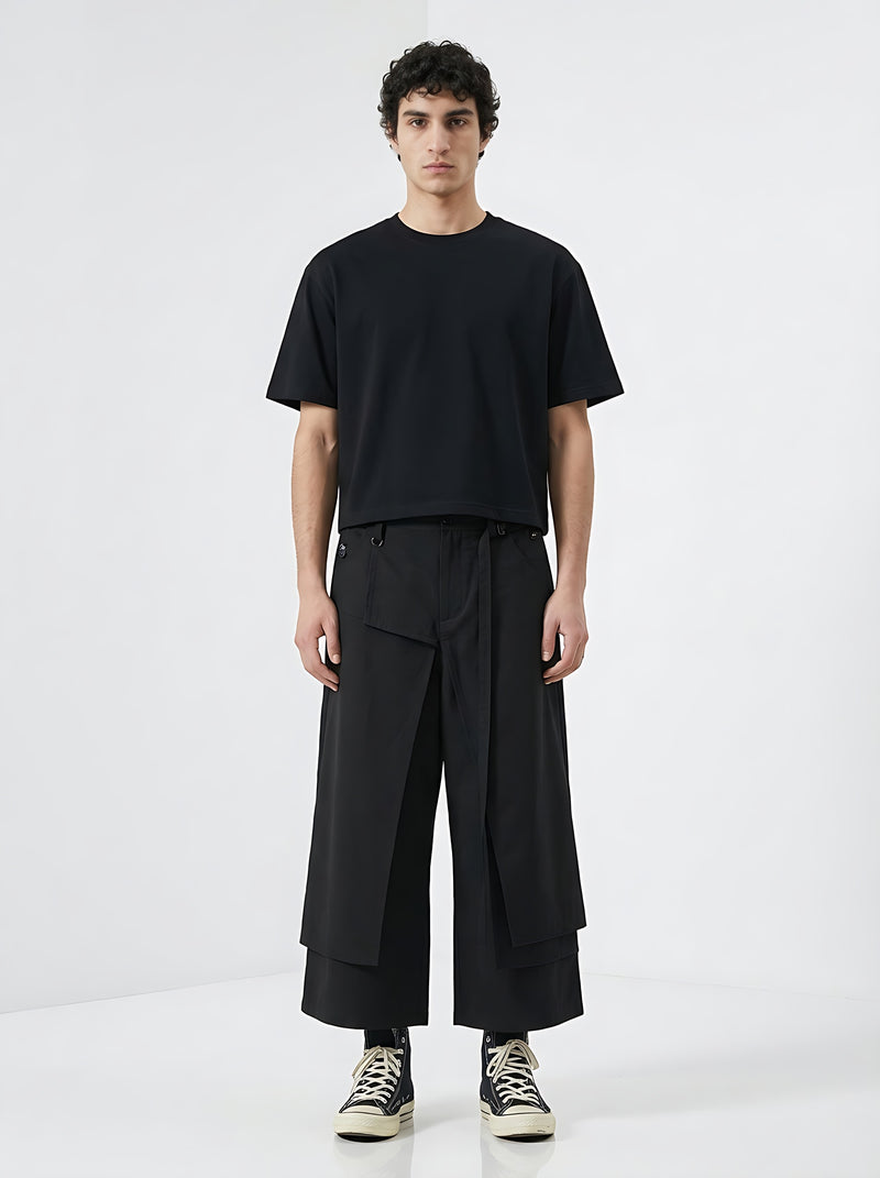 Japanese wide leg trousers worn by a model, front view