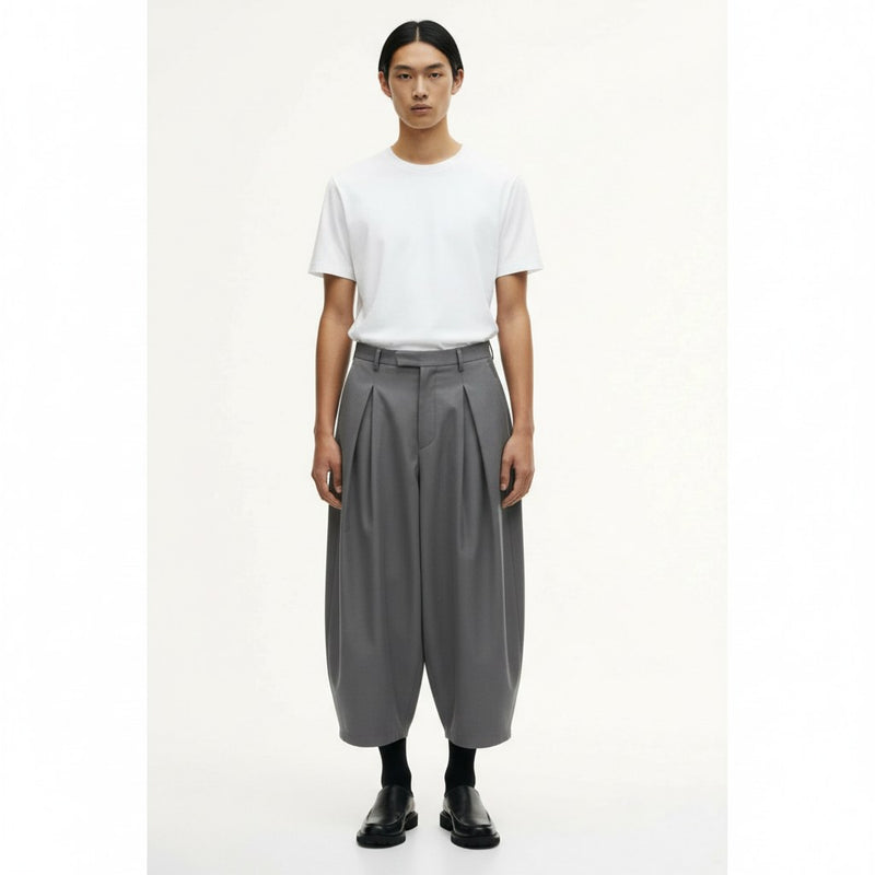 Monpe balloon pants on model in gray, front view