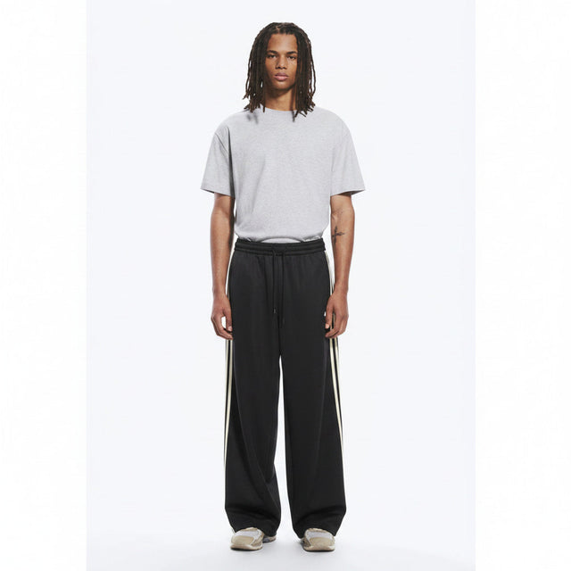 Striped Wide-Leg Track Pants on model - front view