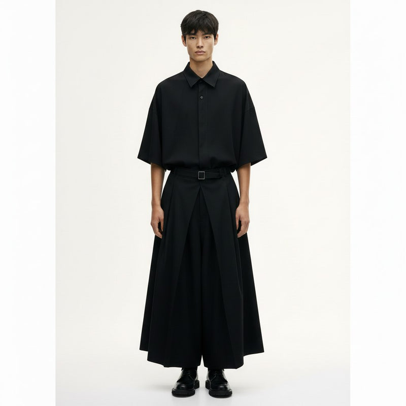 Belted hakama trousers on model in black, front view