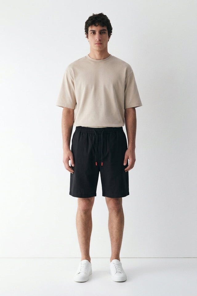 Tekida Cotton Drawstring Shorts on model, front view