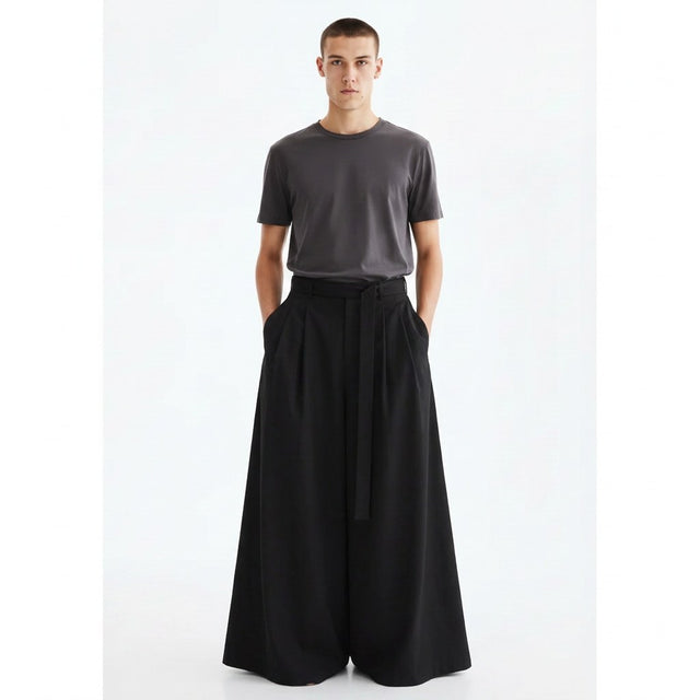 Wide hakama skirt pants in black, front view on model