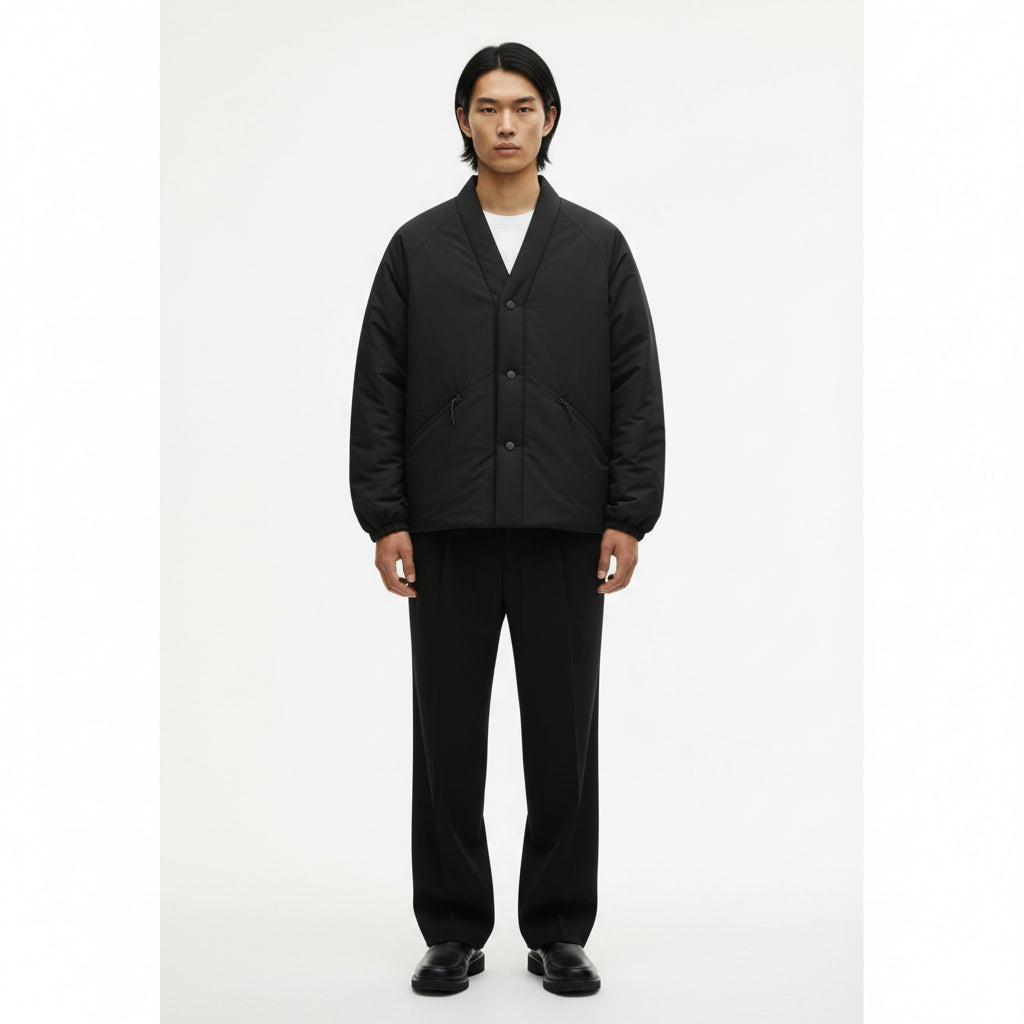 A padded hanten jacket with a crossed kimono-style collar and snap front