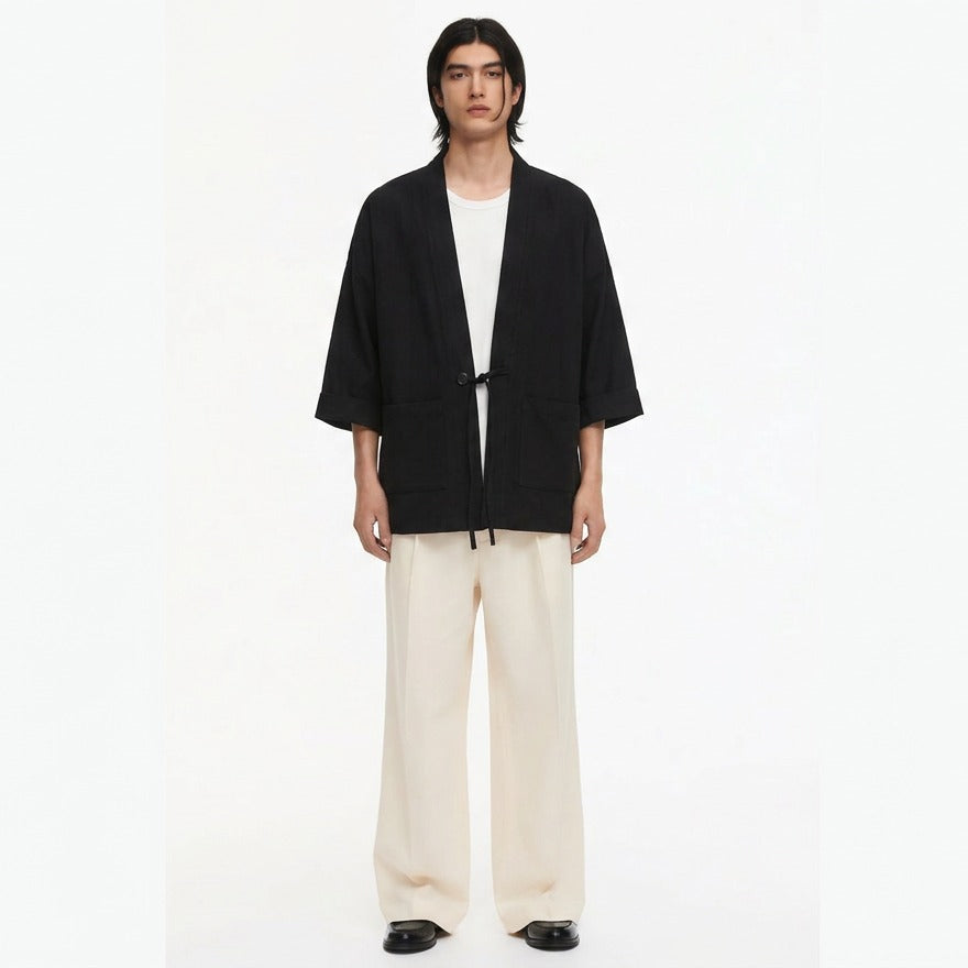 Tied noragi jacket with a crossover front and patch pockets