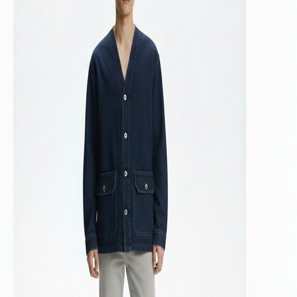 Collarless denim chore jacket on model, detail of the fabric and construction