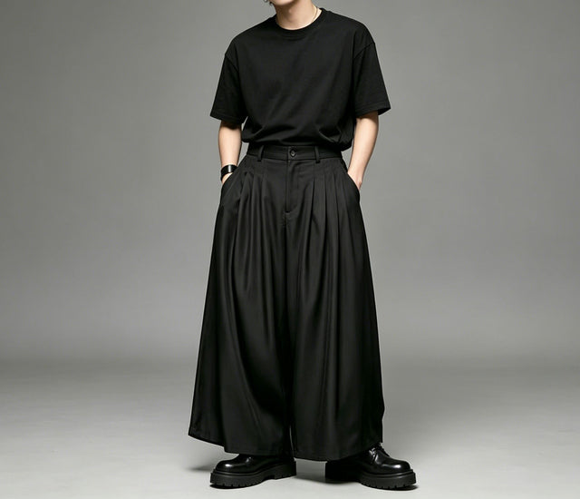 Wide pleated Japanese hakama in black, front: deep pleats from a high waist into very wide legs