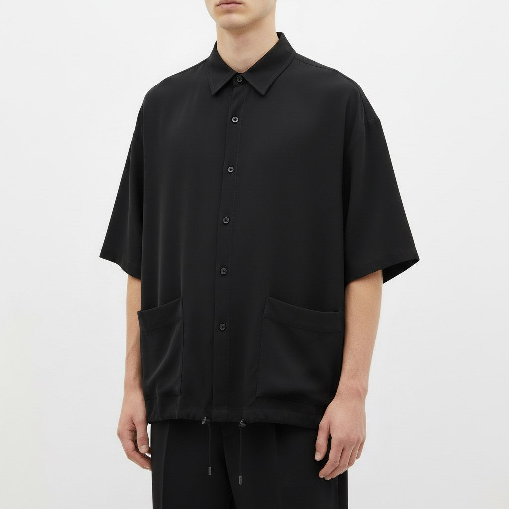 Boxy lyocell shirt on model, close view of the fabric and construction