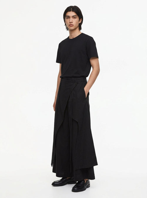 Men's Dark Cotton Hakama Pants, three-quarter view: the asymmetric wrap panel overlapping the wide leg