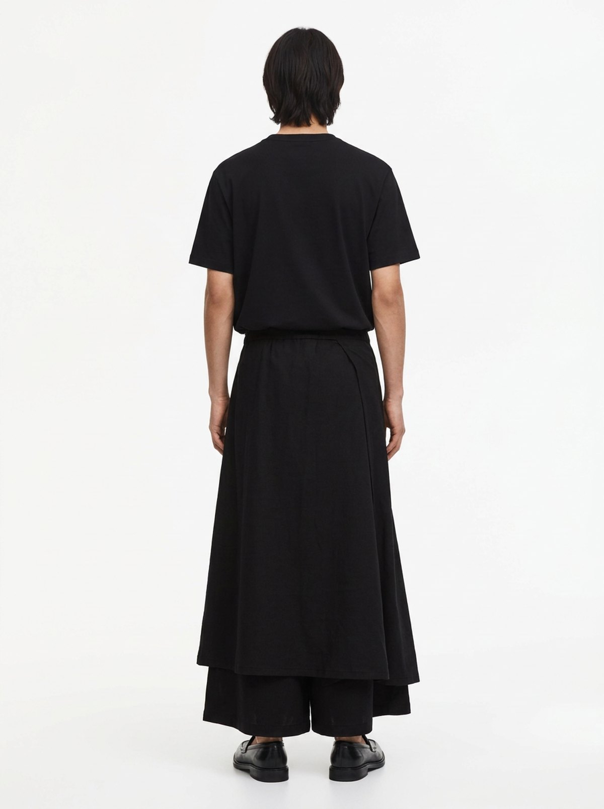 Men's Dark Cotton Hakama Pants, back view: full back panel over a layered hem