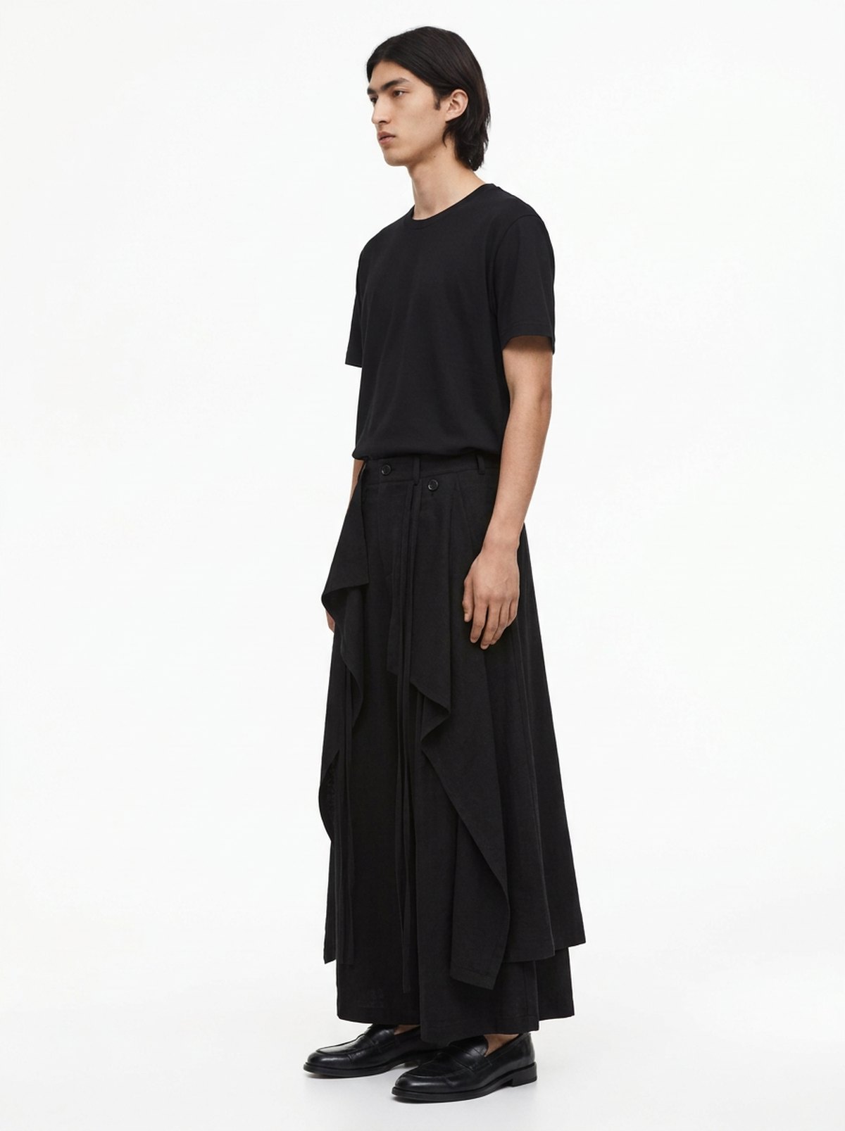 Men's Dark Cotton Hakama Pants, side view: the layered drape and side ties over the wide leg