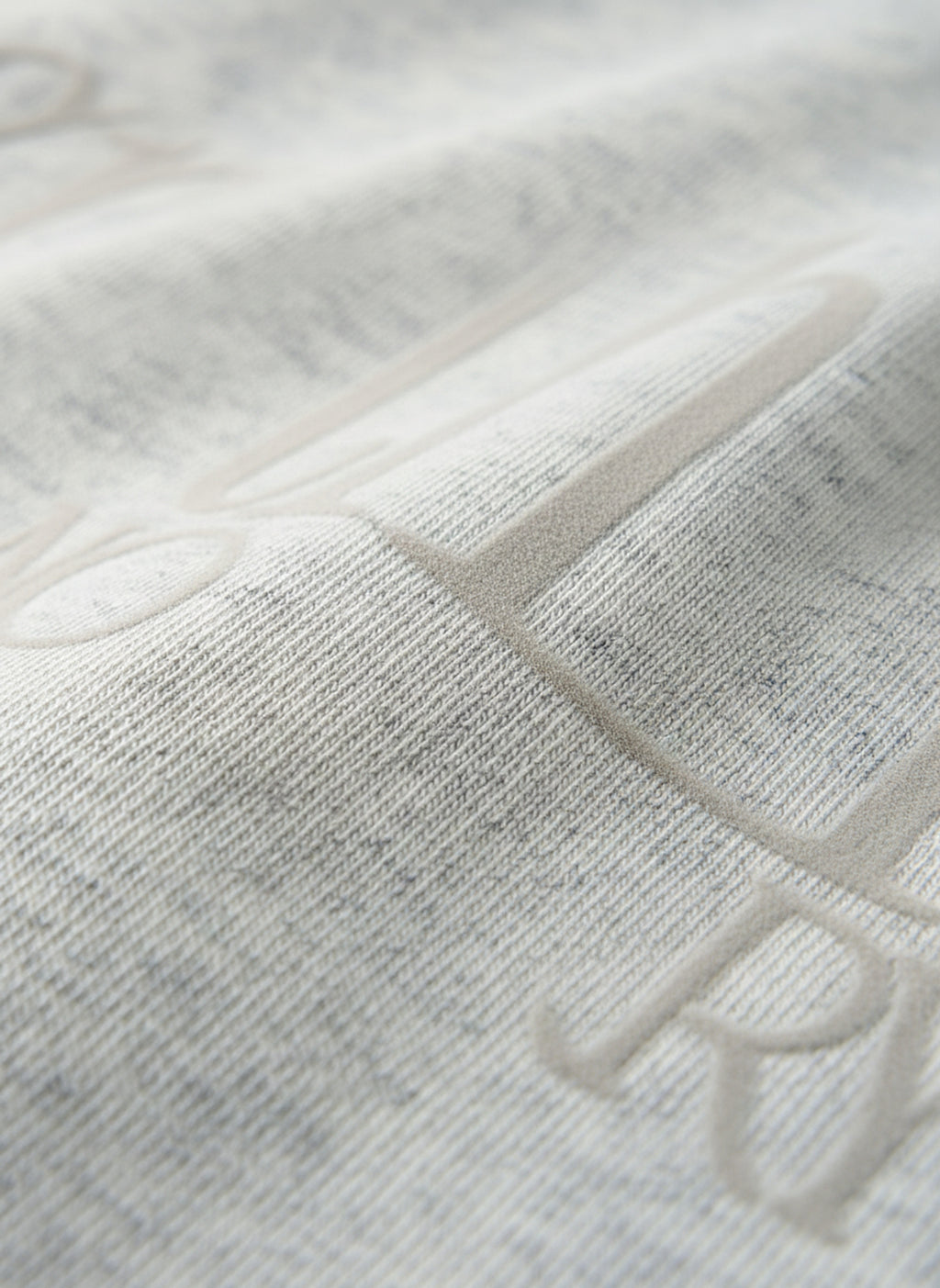 Heavyweight Rolled-Sleeve Graphic T-Shirt - Embossed lettering texture detail
