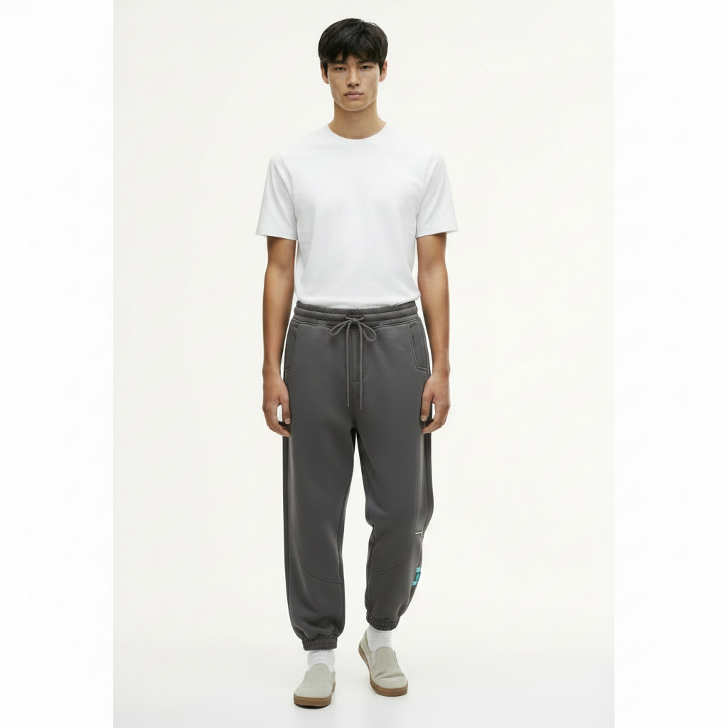 Fleece-Lined Sweatpants Tapered Fit on model - Dark Gray front view