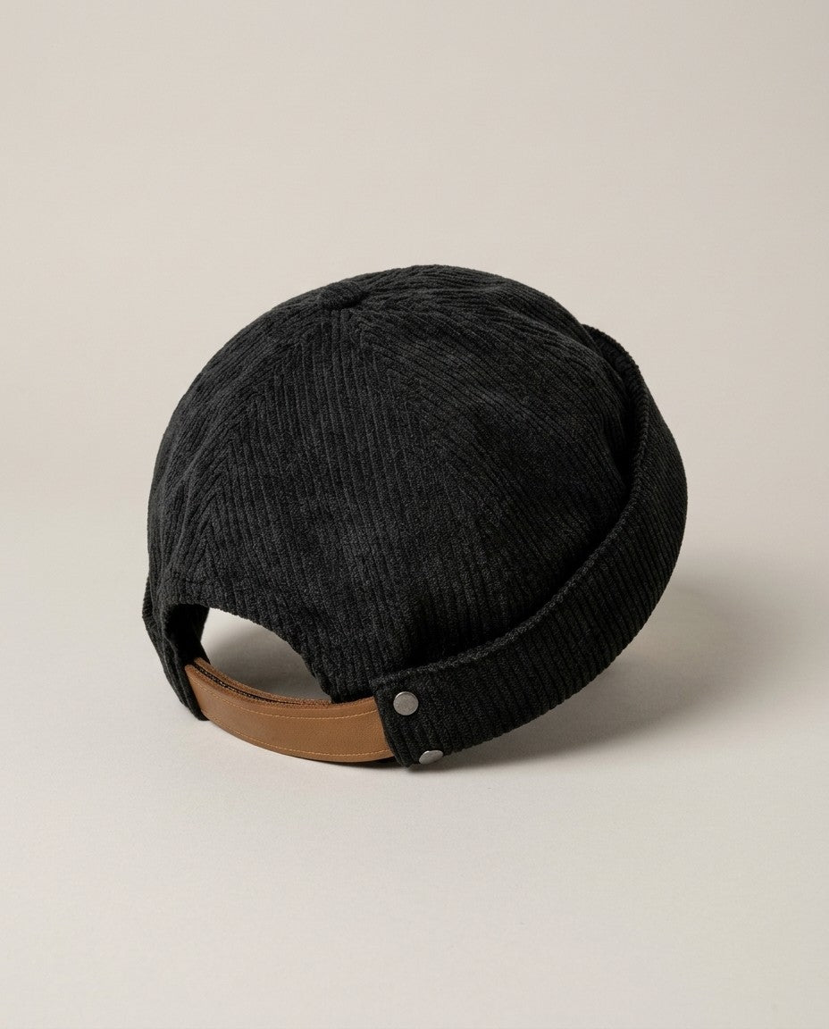 Docker hat back with an adjustable leather strap