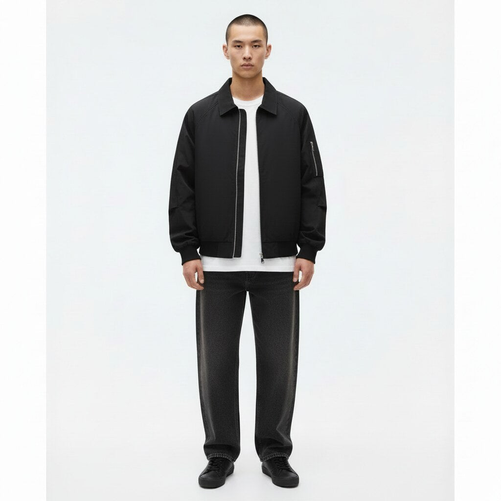 Drizzler Jacket on model in black, front view