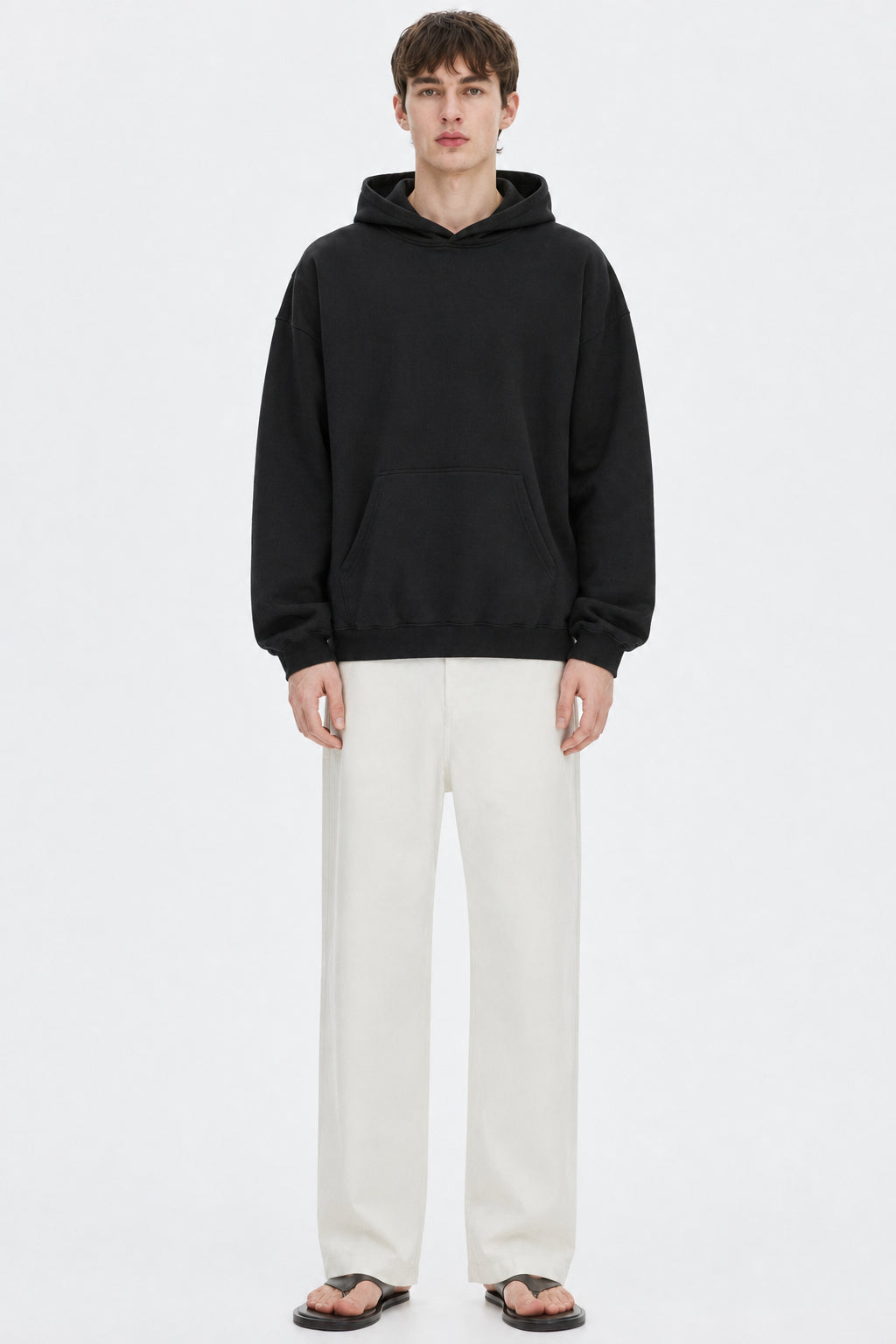 Heavyweight Polyester Hoodie on model - Black - front