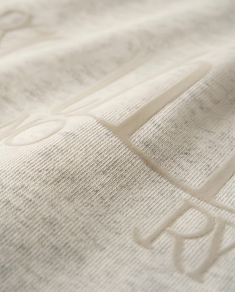 Heavyweight Rolled-Sleeve Graphic T-Shirt - Embossed lettering texture detail