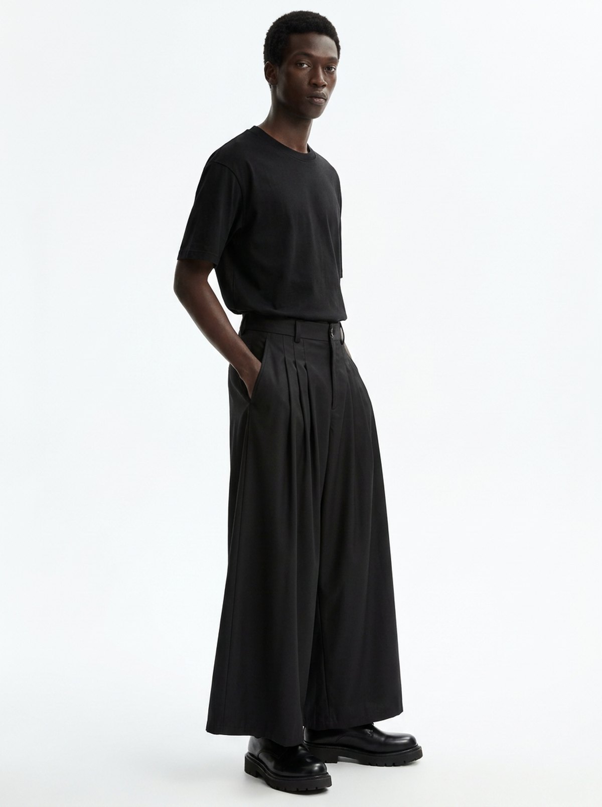 Men's Wide Pleated Japanese Hakama Pants, three-quarter view showing the full volume of the wide leg