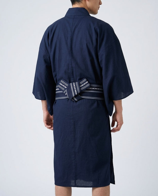 Men's kaku obi in navy tied at the back of a yukata