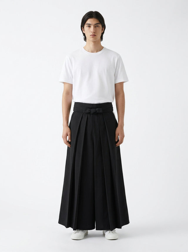 Cotton kendo hakama in black, front view on model, worn with a white t-shirt