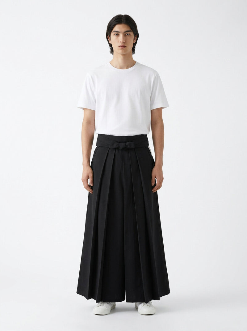 Kendo hakama in black, front view on model, worn with a white t-shirt
