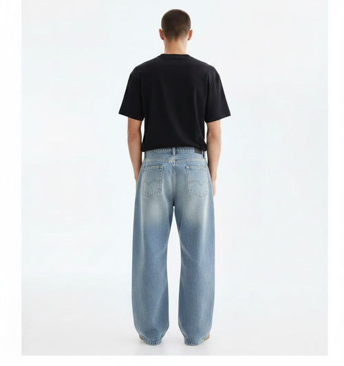 Light Wash Baggy Jeans on model, back view