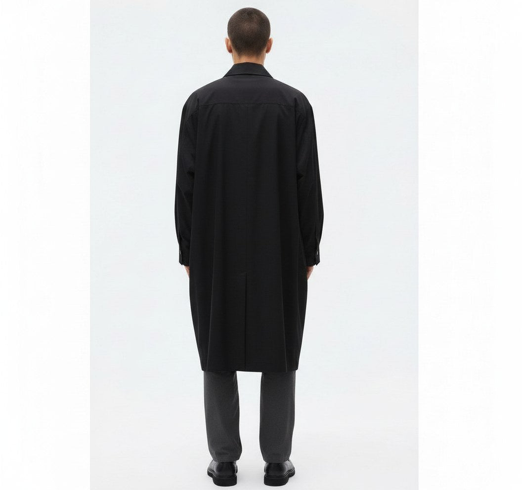 Long draped lyocell shirt on model in black, back view