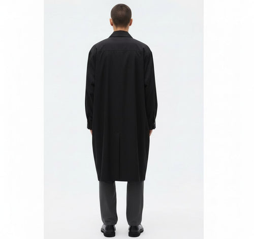 Long draped lyocell shirt on model in black, back view