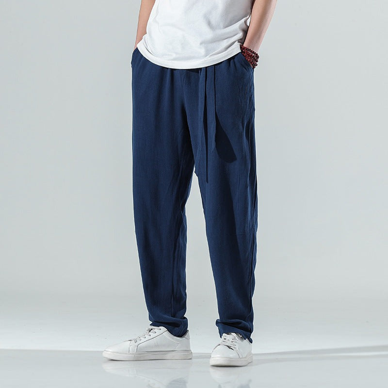 Men's cotton linen pants, loose straight leg, blue, on model