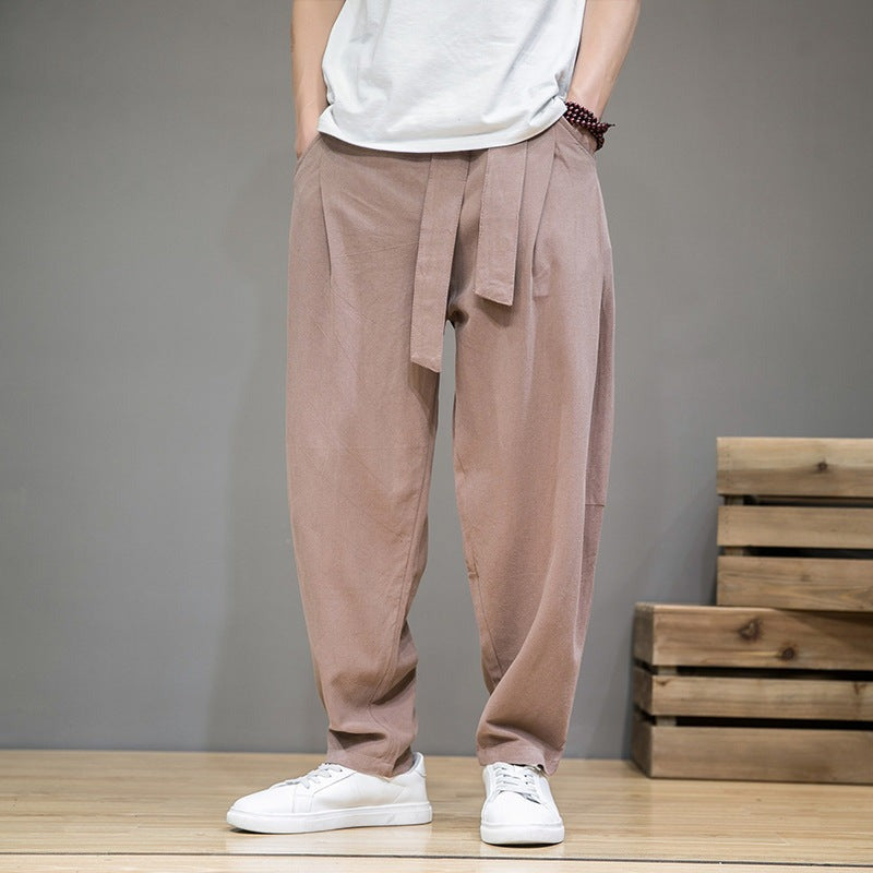 Men's cotton linen pants, loose straight leg, brown, on model