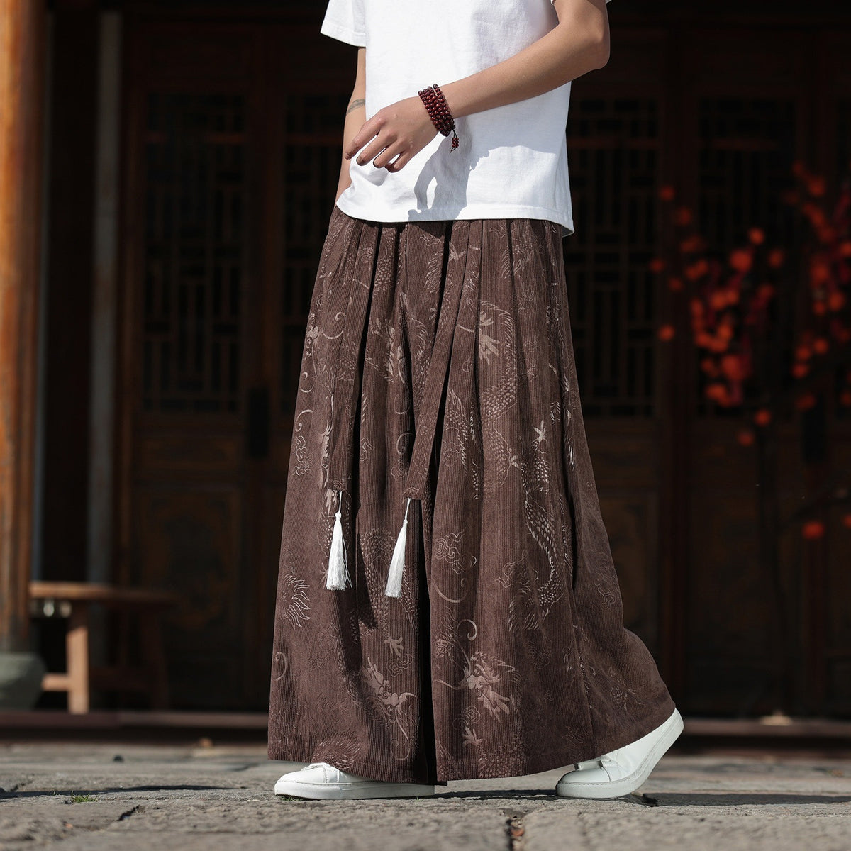 Men's dragon pants, dragon jacquard wide leg, brown, on model