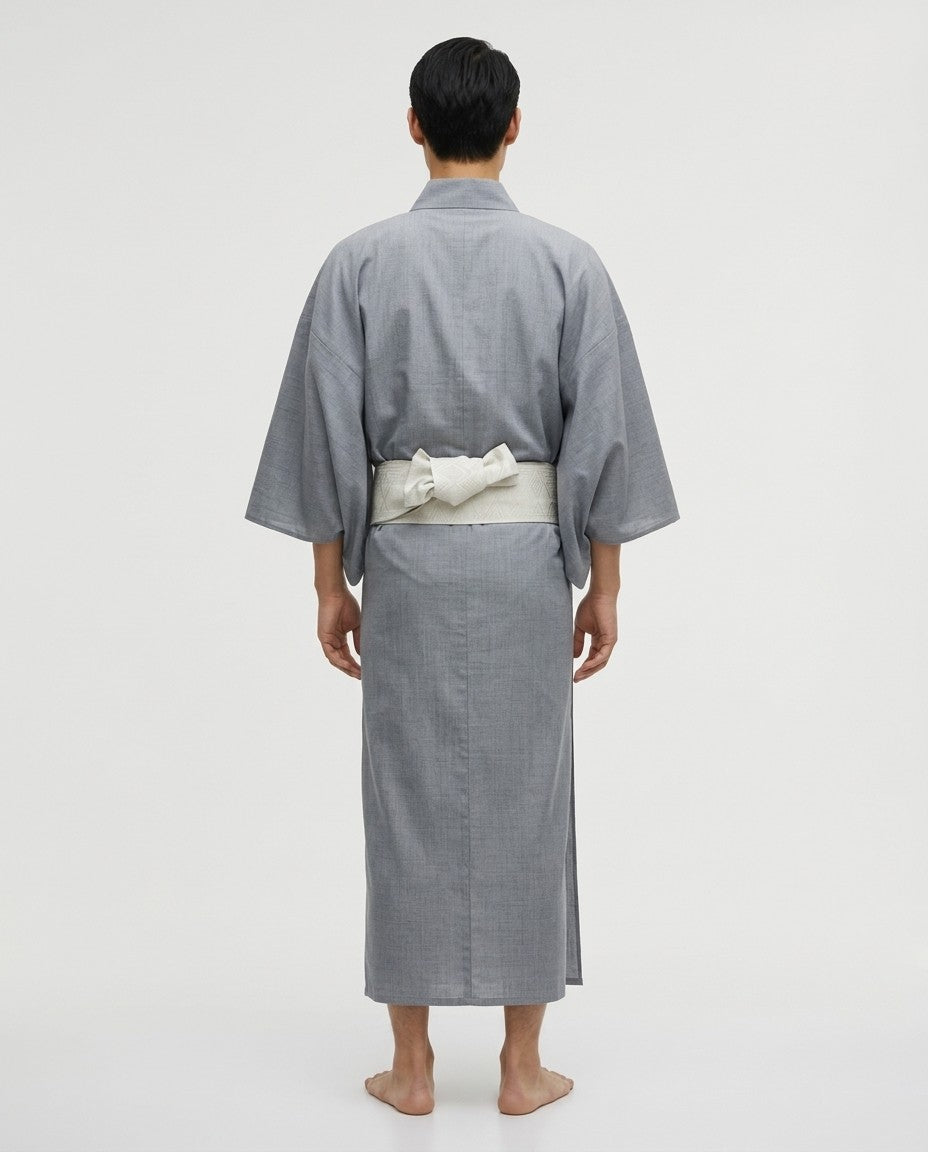 Light blue kimono on a model, back view with the belt tied