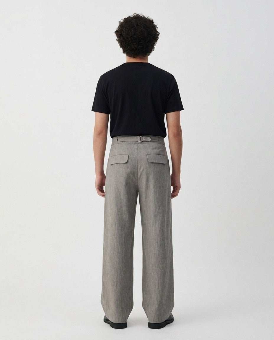 Mens pleated linen pants in gray on a model, back view
