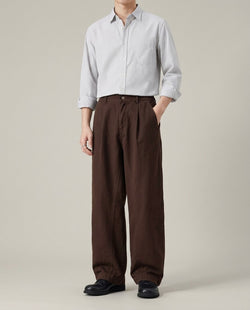 Men's wide leg barrel pants in brown, front