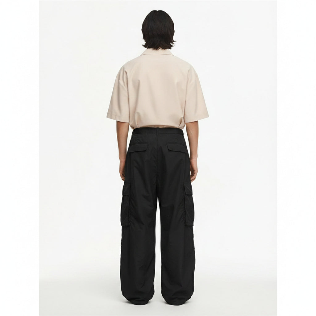 Wide-Leg Nylon Cargo Pants on model - Black - back