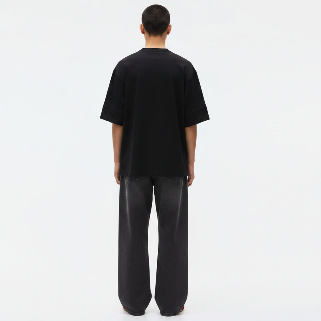 Heavyweight Rolled-Sleeve Graphic T-Shirt on model - Black - back