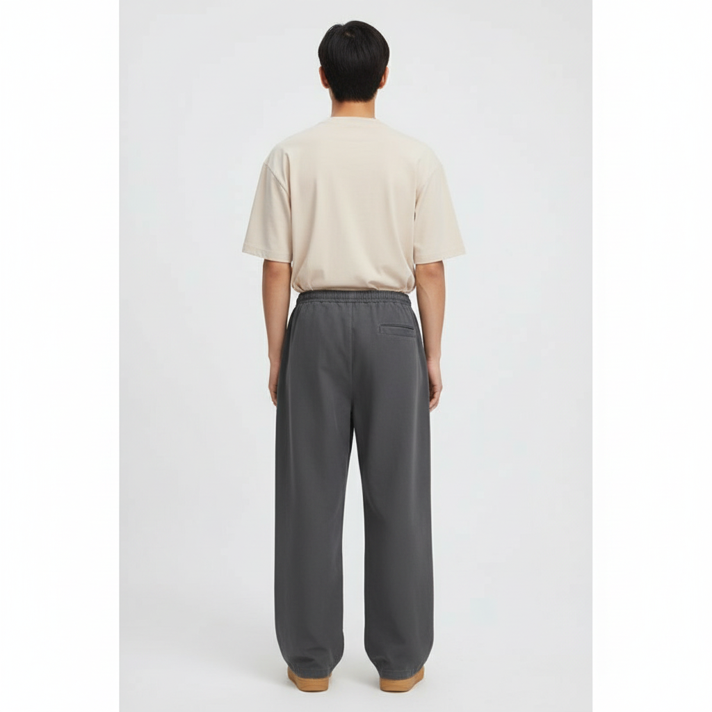 Drawstring Twill Chinos on model in charcoal, back view