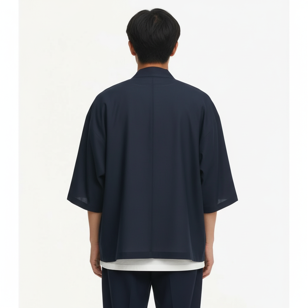 Crane embroidered kimono jacket in navy, back view on model