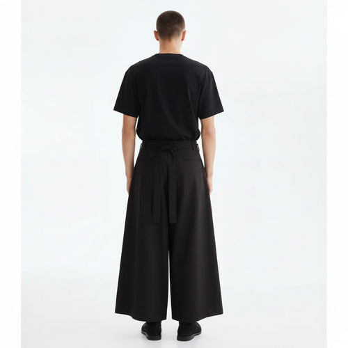 Wide hakama skirt pants in black, back view on model