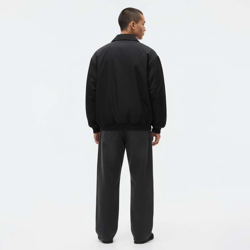 Drizzler Jacket on model in black, back view