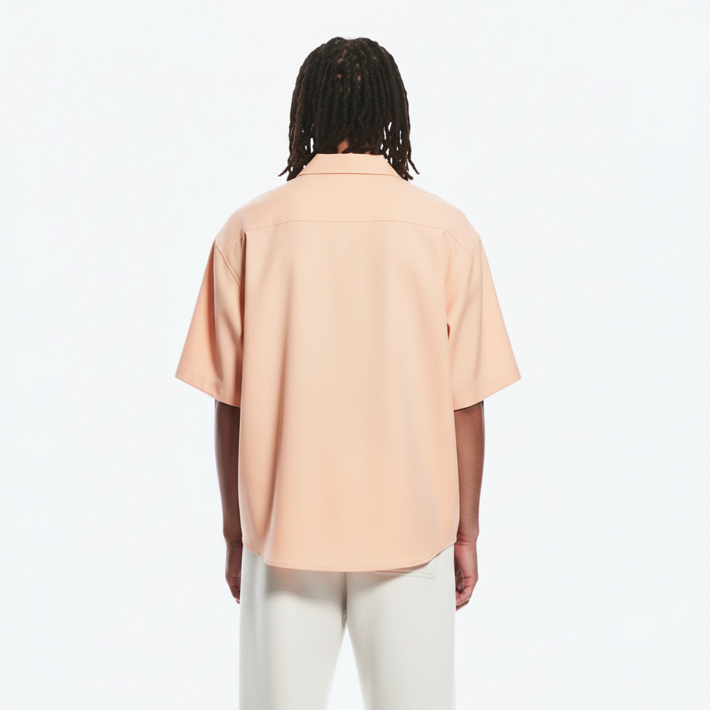 Japanese button up shirt on model in apricot, back view