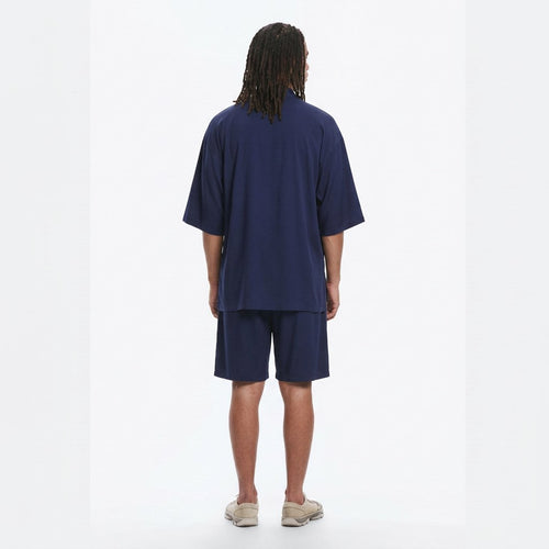 Modal jinbei set in navy, back view on model