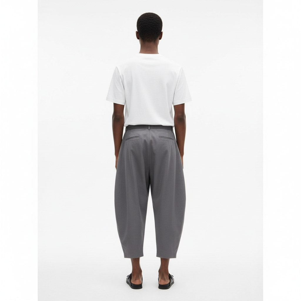 Monpe balloon pants on model in gray, back view