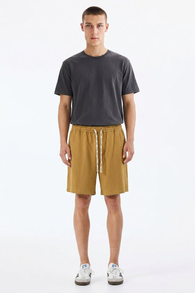 Atoji Above the Knee Shorts on model, front view