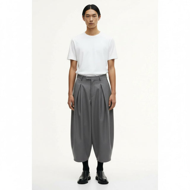 Monpe balloon pants on model in gray, front view