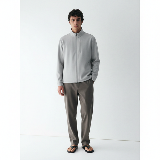 Stretch Travel Jacket on model in light grey, front view