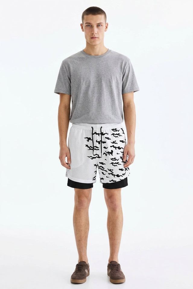 Monochrome Squiggle Panel Gym Shorts on model - Sk 064 - front
